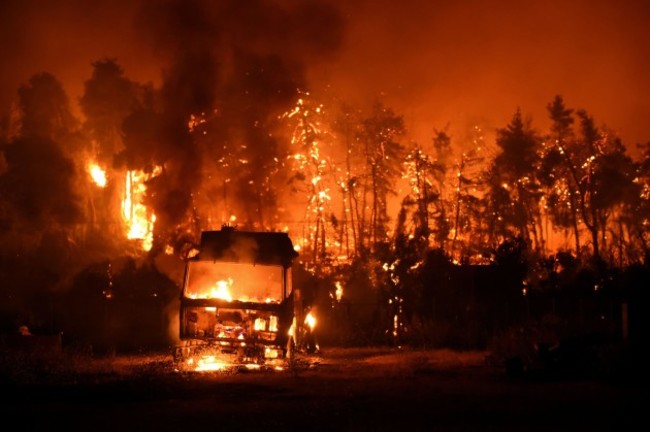 a-wildfire-burns-in-the-village-of-vasilika-on-evia-island-greece-august-7-2021-picture-taken-august-7-2021-reutersalexandros-avramidis