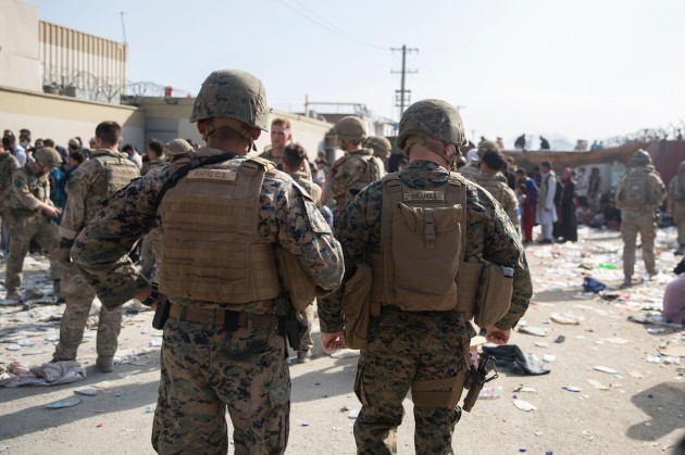 kabul-afghanistan-24th-aug-2021-u-s-marines-maintain-security-as-brig-gen-farrell-sullivan-the-commander-of-the-naval-amphibious-task-force-5-15th-marine-expeditionary-brigade-views-the-sit