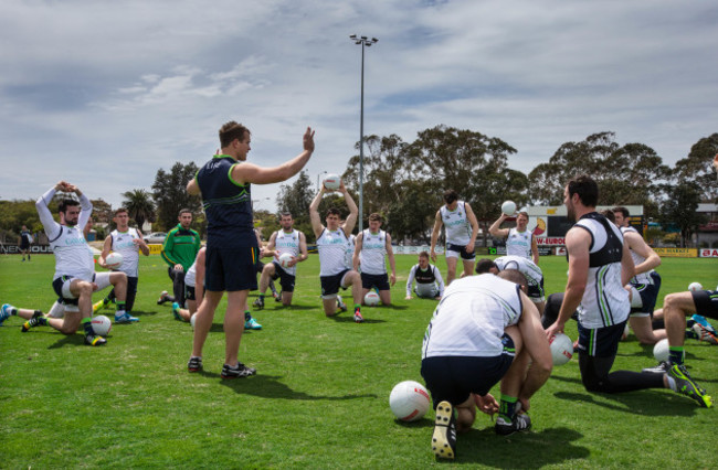 nicholas-walsh-leads-the-players-in-a-warm-up