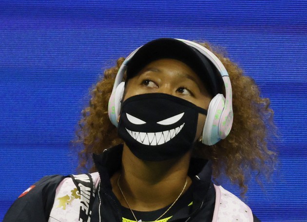 flushing-meadow-united-stated-30th-aug-2021-naomi-osaka-of-japan-wears-a-face-mask-as-she-enters-the-court-tp-play-marie-bouzkova-of-czech-republic-in-arthur-ashe-stadium-in-the-first-round-of-the