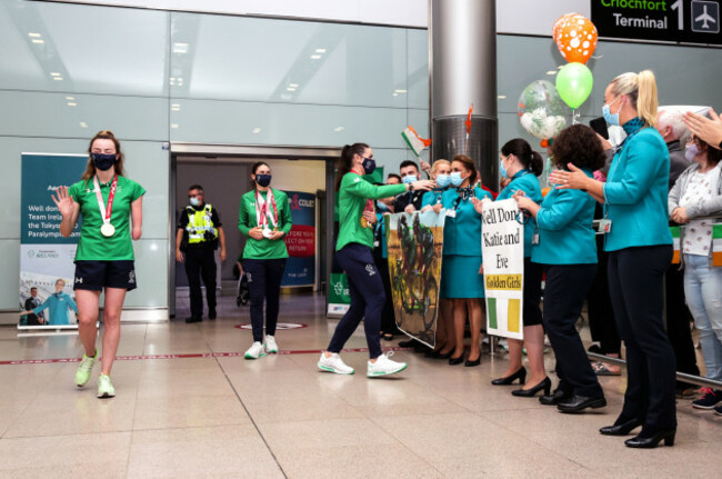 ellen-keane-katie-george-dunlevy-and-eve-mccrystal-are-greeted-as-they-arrive-home