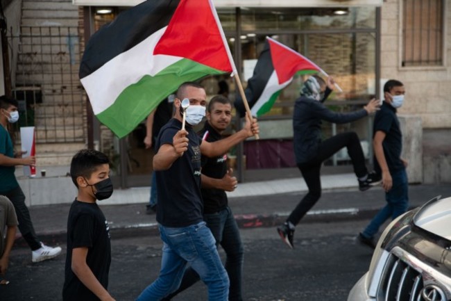 arab-israeli-protestors-waving-palestine-flags-and-spoons-which-were-used-for-the-escape-of-the-six-palestinian-prisoners-from-the-gilboa-prison-this-week-the-protest-in-umm-al-fahm-today-condemned