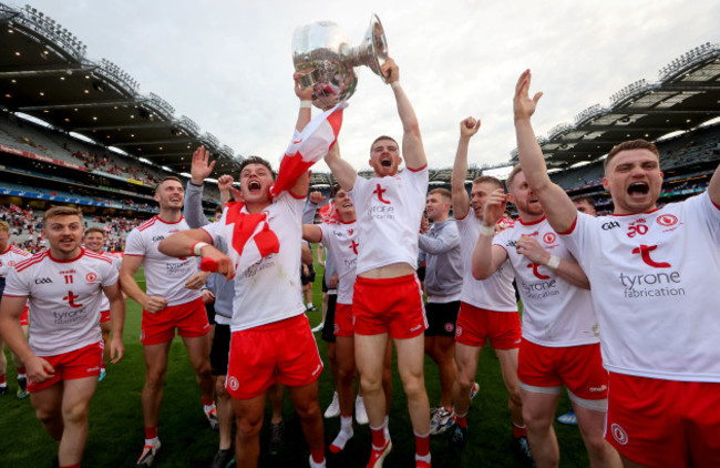 michael-mckernan-and-cathal-mcshane-celebrate-with-the-trophy