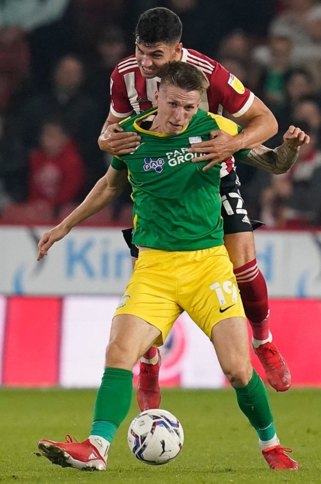 sheffield-england-14th-september-2021-john-egan-of-sheffield-utd-and-emil-riis-jakobsen-of-preston-north-end-during-the-sky-bet-championship-match-at-bramall-lane-sheffield-picture-credit-should