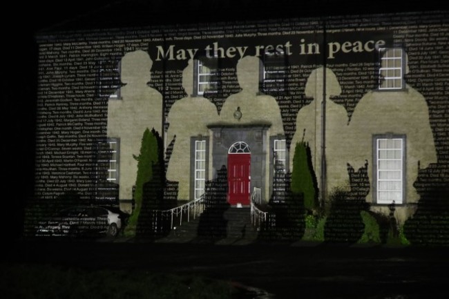 an-image-of-silhouettes-of-children-and-the-names-of-children-who-died-in-bessborough-mother-and-baby-home-in-cork-are-projected-onto-sean-ross-abbey-south-of-roscrea-in-county-tipperary-ireland-on