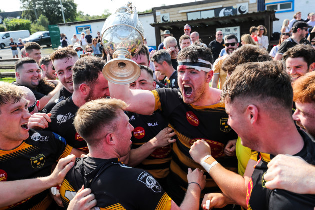 colm-skehan-celebrates-with-the-munster-senior-challenge-cup-with-teammates