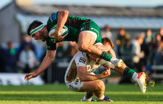 tom-daly-is-tackled-by-jack-dixon