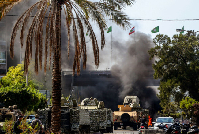 beirut-lebanon-14th-oct-2021-lebanese-army-deployed-in-the-area-of-in-the-area-of-tayouneh-after-gunfire-erupted-at-a-protest-by-supporters-of-the-shiite-hezbollah-movement-against-the-judge-inve