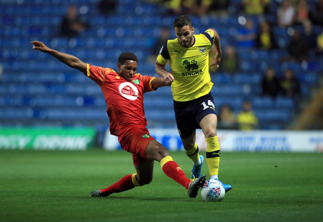 oxford-uniteds-anthony-forde-right-and-norwich-citys-u21-william-hondermarck-left-battle-for-the-ball-during-the-efl-trophy-southern-section-group-b-match-at-the-kassam-stadium-oxford