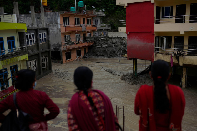 sindhupalchowk-district-nepal-19th-june-2021-flood-water-gushes-through-houses-that-wreaked-havoc-in-the-melamchi-river-in-sindhupalchowk-district-nepal-on-saturday-june-19-2021-according-to-m