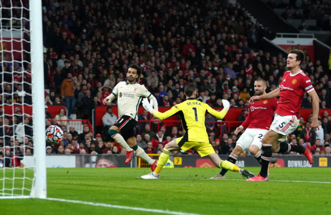 liverpools-mohamed-salah-left-scores-their-sides-fifth-goal-of-the-game-completing-his-hat-trick-during-the-premier-league-match-at-old-trafford-manchester-picture-date-sunday-october-24-2021