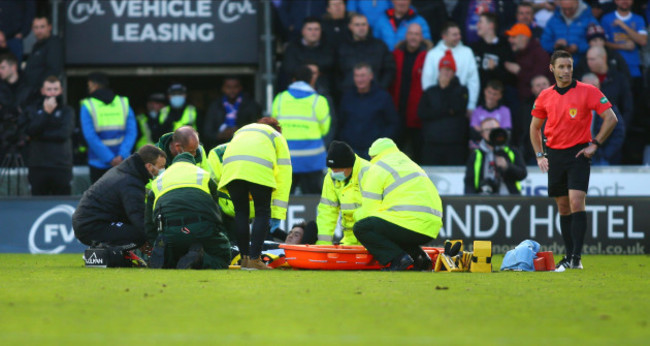 24th-october-2021-st-mirren-park-paisley-renfrewshire-scotland-scottish-premier-league-football-st-mirren-v-rangers-fc-jamie-mcgrath-of-st-mirren-is-treated-by-physio-and-first-aid-staff