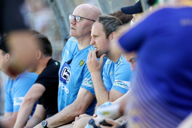 michael-murphy-watches-the-game-from-the-bench-after-receiving-a-red-card