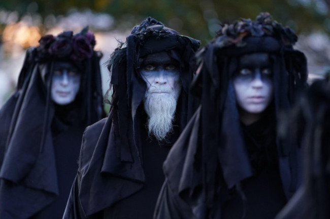 climate-activists-from-ocean-rebellion-representing-oil-slicks-protest-outside-grangemouth-oil-refinery-in-falkirk-during-cop26-in-glasgow-picture-date-tuesday-november-2-2021