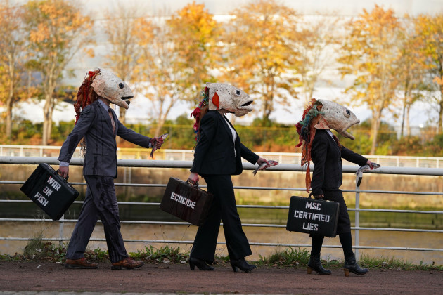 a-performer-with-a-bleeding-fishhead-mask-wearing-a-pinstripe-suit-during-a-demonstration-in-glasgow-by-ocean-rebellion-against-the-marine-stewardship-council-msc-picture-date-thursday-november-4