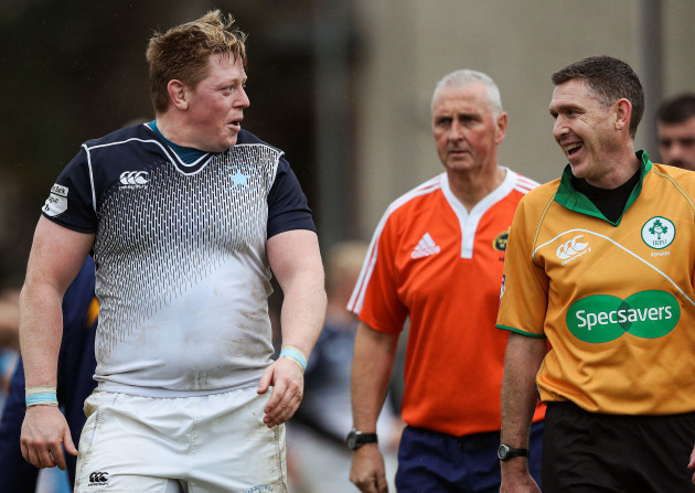 niall-horan-jokes-with-match-referee-george-clancy-after-the-game
