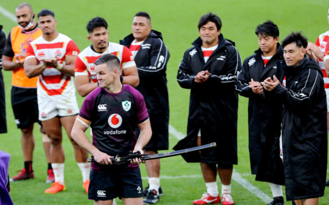 johnny-sexton-celebrates-after-being-presented-with-a-ceremonial-sword-from-the-japan-team-after-winning-his-100th-cap-for-ireland