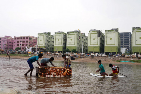 chennai-tamil-nadu-india-9th-nov-2021-children-are-playing-with-thermocol-rafts-at-a-flooded-portion-of-marina-beach-following-the-heavy-rainfall-in-chennai-credit-image-sri-loganathan