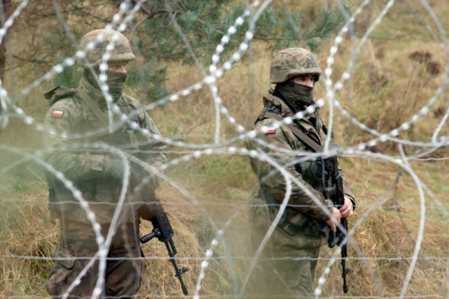 grodno-region-belarus-november-10-2021-polish-servicemen-guard-the-belarusian-polish-border-according-to-the-polish-border-guard-several-thousand-migrants-have-been-approaching-the-polish-borde