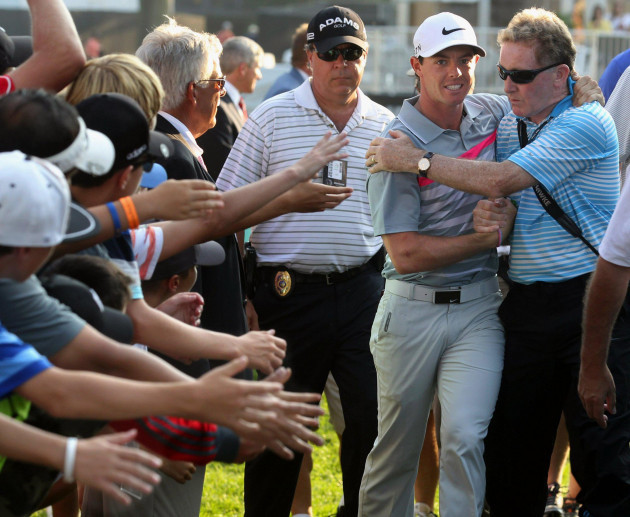 akron-ohio-3rd-aug-2014-rory-mcilroy-gets-a-hug-from-his-coach-michael-bannon-as-he-heads-to-sign-his-scorecard-after-winning-the-world-golf-championships-bridgestone-invitational-at-firestone-cou