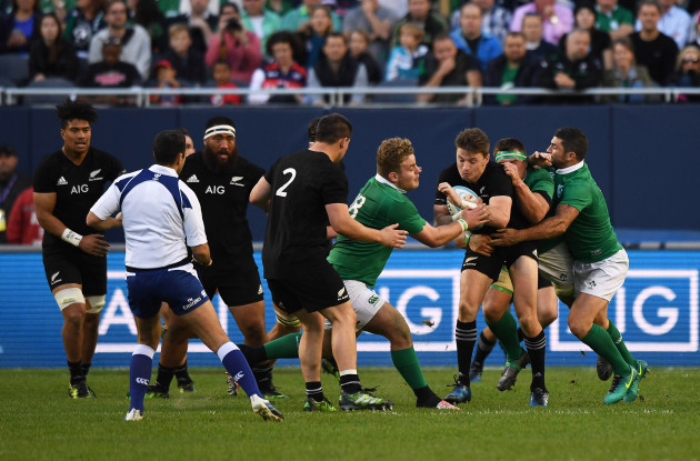 beauden-barrett-is-tackled-by-finlay-bealham-cj-stander-and-rob-kearney