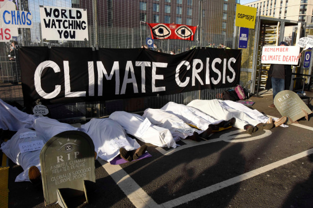 glasgow-scotland-uk-11th-nov-2021-on-remembrance-day-climate-activists-gathered-outside-the-entrance-to-cop26-climate-summit-in-glasgow-to-remember-all-those-who-have-died-due-to-the-effects-of-c