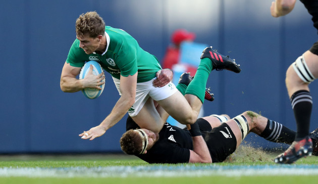 irelands-andrew-trimble-is-tackled-by-new-zealand-all-blackss-sam-cane
