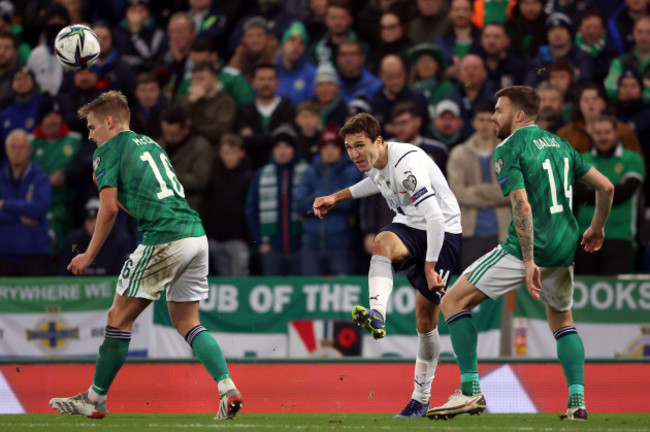 italys-federico-chiesa-crosses-the-ball-under-pressure-from-northern-irelands-stuart-dallas-during-the-fifa-world-cup-qualifying-match-at-windsor-park-belfast-picture-date-monday-november-15-202