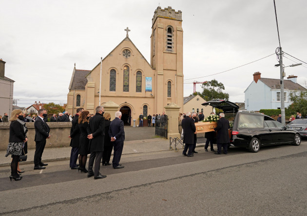 the-coffin-of-sean-fitzpatrick-the-former-chief-executive-and-chairman-of-anglo-irish-bank-is-carried-into-holy-rosary-church-greystones-ireland-ahead-of-his-funeral-picture-date-tuesday-novemb