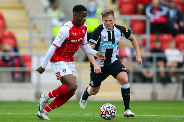 rotherham-uniteds-chiedozie-ogbene-and-newcastle-uniteds-matt-ritchie-during-the-pre-season-friendly-match-at-the-aesseal-new-york-stadium-rotherham-picture-date-tuesday-july-27-2021