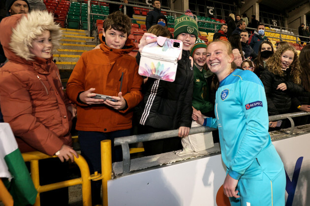 courtney-brosnan-poses-for-a-photo-with-fans-after-the-game