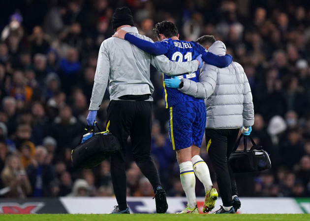 chelseas-ben-chilwell-is-helped-off-the-pitch-with-an-injury-during-the-uefa-champions-league-group-h-match-at-stamford-bridge-london-picture-date-tuesday-november-23-2021