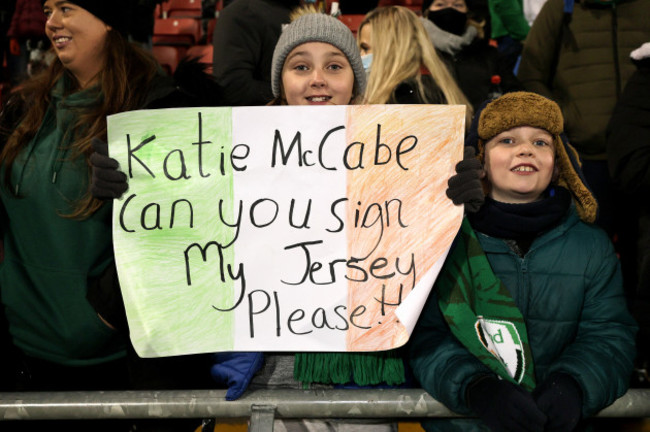 a-young-fan-holds-up-a-sign-after-the-game