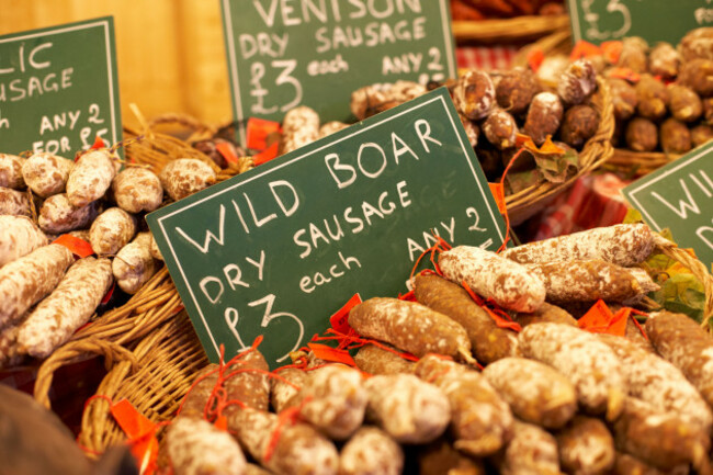 selection-of-dry-cured-meat-sausages-including-wild-boar-on-a-stall-in-the-continental-market-belfast-northern-ireland-uk-united