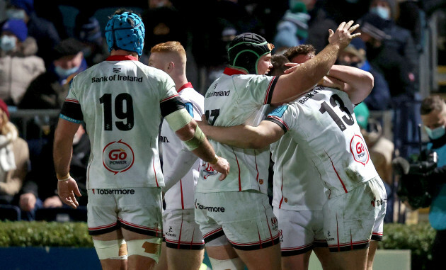 james-hume-celebrates-scoring-a-try-with-teammates