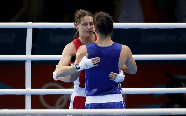irelands-katie-taylor-red-commiserates-with-sofya-ochigava-blue-of-russia