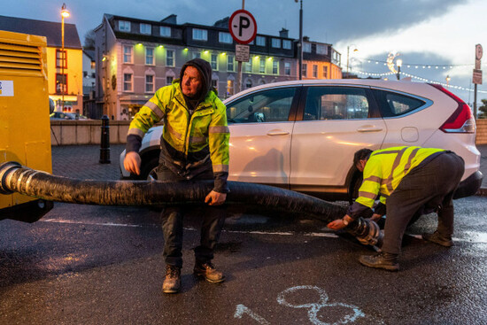 bantry-west-cork-ireland-6th-dec-2021-cork-county-council-employees-were-preparing-pumps-this-evening-for-expected-flooding-tomorrow-morning-after-met-eireann-issued-a-status-red-weather-warning