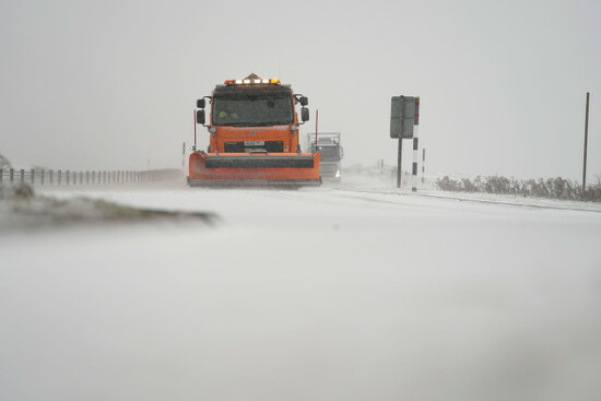 a-snowplough-makes-its-way-through-falling-snow-on-the-a66-between-stainmore-and-bowes-as-storm-barra-hit-the-uk-and-ireland-with-disruptive-winds-heavy-rain-and-snow-on-tuesday-picture-date-tuesda