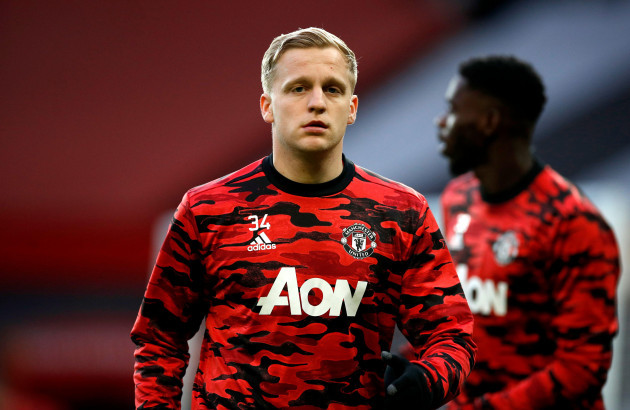 manchester-uniteds-donny-van-de-beek-warms-up-prior-to-the-premier-league-match-at-old-trafford-manchester-picture-date-sunday-april-4-2021