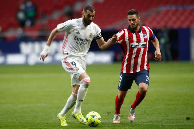 karim-benzema-of-real-madrid-and-jorge-resurreccion-koke-of-atletico-de-madrid-during-the-spanish-championship-la-liga-football-match-between-atletico-de-madrid-and-real-madrid-on-march-7-2021-at-w