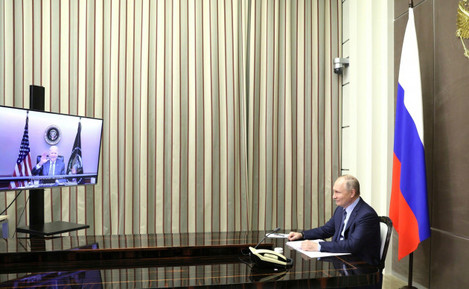 sochi-russia-07th-dec-2021-russian-president-vladimir-putin-smiles-at-the-start-of-virtual-bilateral-discussions-with-u-s-president-joe-biden-via-teleconference-rom-his-black-sea-residence-bochar