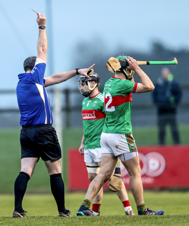 noel-mcgrath-is-given-a-red-card-by-johnny-murphy