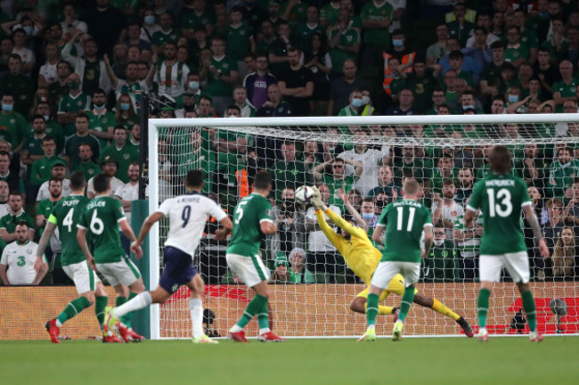 republic-of-irelands-gavin-bazunu-saves-the-shot-of-serbias-aleksandar-mitrovic-during-the-2022-fifa-world-cup-qualifying-match-at-aviva-stadium-dublin-picture-date-tuesday-september-7-2021