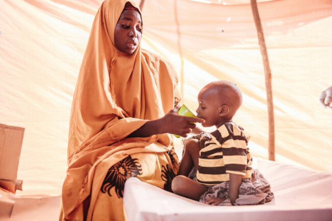 Zeinab Odowa Colow with her son, Osman in  Dollow CTC