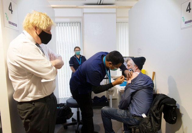 prime-minister-boris-johnson-during-a-visit-to-a-covid-vaccination-centre-at-the-rainbow-pharmacy-in-the-open-university-campus-walton-hall-milton-keynes-buckinghamshire-picture-date-wednesday-de