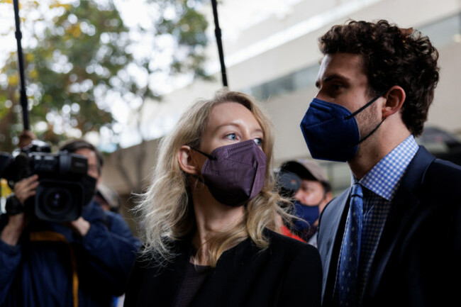 theranos-founder-elizabeth-holmes-arrives-with-her-partner-billy-evans-as-the-jury-continues-to-deliberate-in-her-fraud-trial-at-federal-court-in-san-jose-california-u-s-december-23-2021-reuter