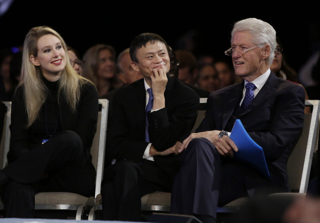 ceo-of-theranos-elizabeth-holmes-executive-chairman-alibaba-group-jack-ma-and-former-united-states-president-bill-clinton-wait-to-speak-on-stage-about-the-future-of-equality-and-opportunity-at-the-cl