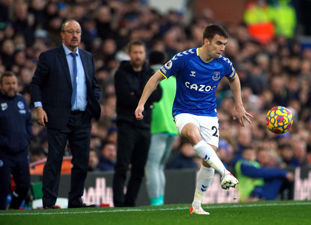 evertons-seamus-coleman-right-as-manager-rafael-benitez-watches-on-during-the-premier-league-match-at-goodison-park-liverpool-picture-date-sunday-january-2-2022