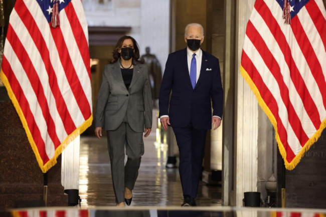 us-president-joe-biden-r-and-us-vice-president-kamala-harris-l-arrive-to-deliver-remarks-on-the-one-year-anniversary-of-the-january-6th-insurrection-in-statuary-hall-of-the-us-capitol-in-washingto