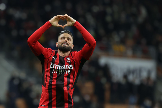 olivier-giroud-of-ac-milan-celebrates-after-scoring-a-goal-during-the-serie-a-202122-football-match-between-ac-milan-and-as-roma-at-giuseppe-meazza-stadium-milan-italy-on-january-06-2022